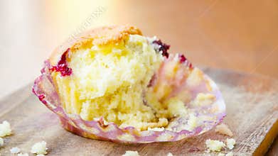 Eating a lemon muffin with cherries time-lapse