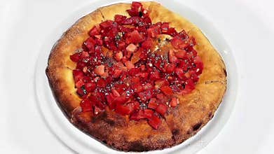 Delicious Italian Focaccia Topped with Fresh Diced Red Tomatoes and Herbs
