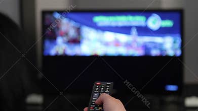 Young woman watching smart TV