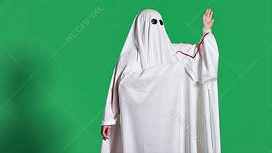 Friendly Ghost in Costume, Waving on Green Screen