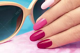 Pink manicure.