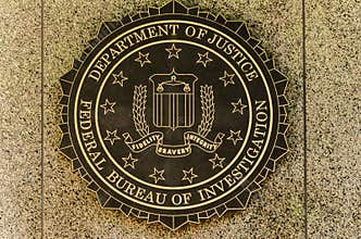 FBI emblem on the J. Edgar Hoover F.B.I. Building in downtown Wa