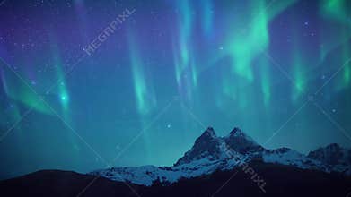 Panoramic view showcasing dancing aurora above snowcovered mountains and glittering night sky