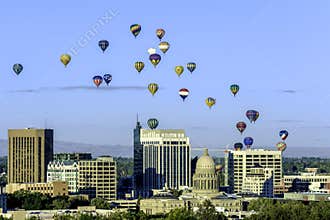 Many hot air ballons over the city of Boise Idaho