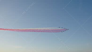 Aerobatic Jets Airshow Over Coastal City