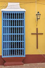 Door and a Christian Cross on a colonial house in Trinidad, Cuba