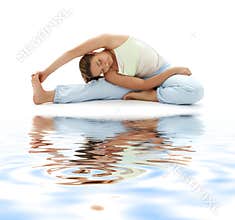 Ashtanga yoga on white sand