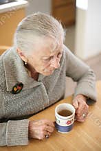 Senior drinking tea