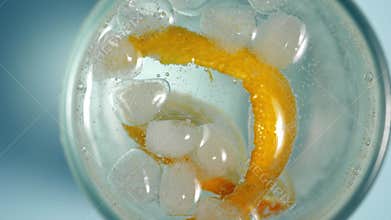 Lemonade with lemon slices and ice in a glass