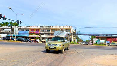 Busy city life heavy traffic jam people cars in Thailand