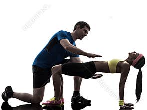 Woman exercising plank position fitness workout wi