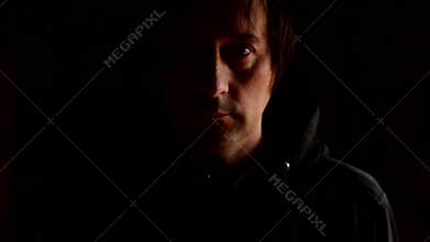 Sad man covering face with hands and crying in despair. Chronic depression, grief, sorrow, sadness, melancholy, moaning concept