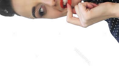 Playful retro pin-up girl with a captivating smile