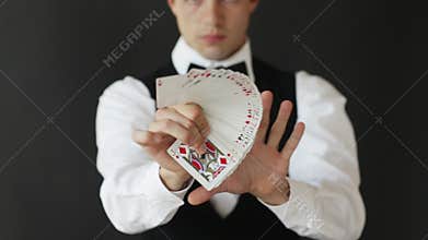 Man showing trick with playing cards