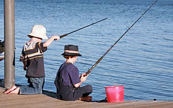 Boys Fishing off Pier