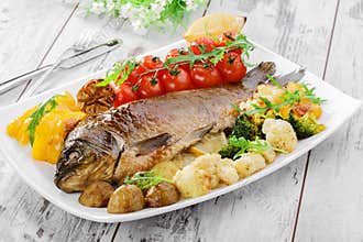 Baked fish with vegetables