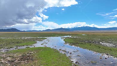 Aerial River Spring Lakes Ecological Reserve Wetlands and Mountains Fly Through