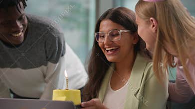 Happy birthday surprise at office amazed shock Indian businesswoman female woman employee get cake blowing candle from