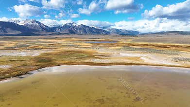 Aerial Wetland Marsh and Sierra Nevada Mountains Owens Valley Fly Through