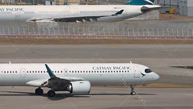 Shot of Cathay Pacific Airbus A321 before departure, side view