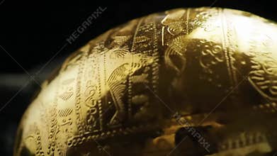 Golden Artifact Close-Up - Intricate Details and Ancient Craftsmanship