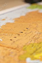 Warsaw, Poland - Dec 5, 2025: Close-up of a map highlighting Russia, displaying detailed geographical features and borde