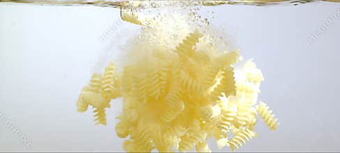 Vivid paints slowly bloom and dance in clear water. Mesmerizing fluid art