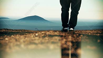 Man walking along the road. one