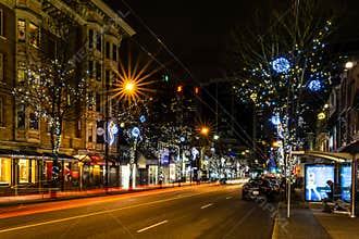 VANCOUVER, CANADA - December 25, 2018: luxury decorated homes and streets with garland lights in canadian city street