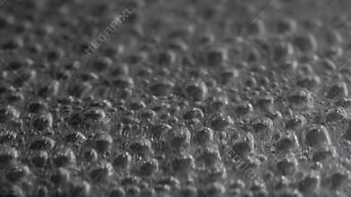 Abstract close-up on the surface of boiling water