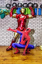 Animators iron man and spider-man in the fitness room