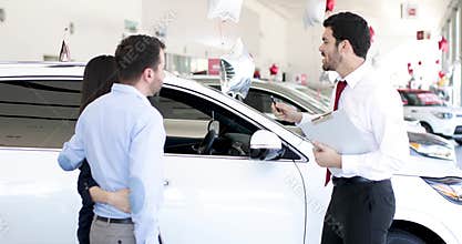 Man selling cars in a dealership