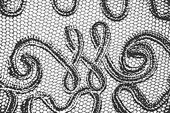 Distress black and white fabric texture with ornament.