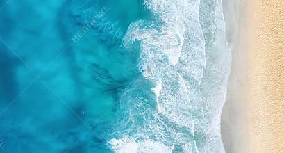 Beach and waves from top view. Turquoise water background from top view.