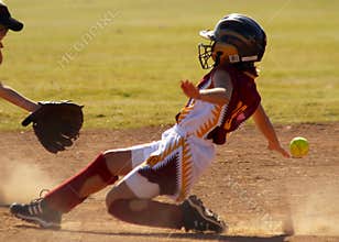 Softball player sliding