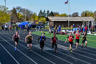 Track and Field Athletes Running Sprint
