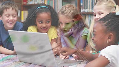 Children watching on a laptop