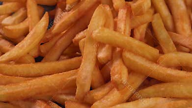 Delicious french fries moving as being served