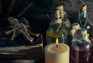A witchery stuff: multiple tincture bottles, bunches of dry healthy herbs, stack of ancient ritual books, amulets, candles...