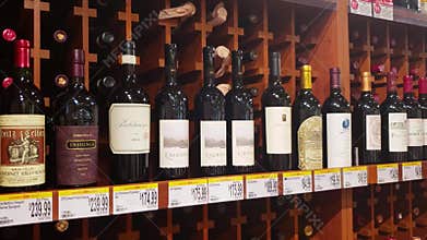 Shelf with a selection of expensive wine bottles