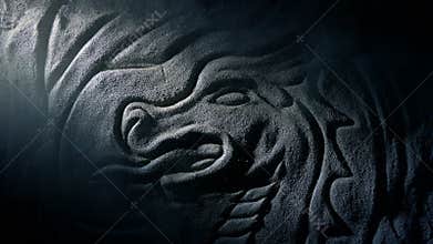 Shaft Of Light Reveals Old Dragon Stone Carving