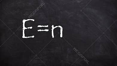 Famous Formula Einstein handwritten animation on blackboard or chalkboard 4k footage