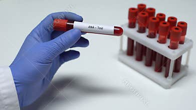 ANA test, doctor showing blood sample in tube, lab research, health checkup