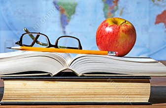 Study Desk With Apple And Books