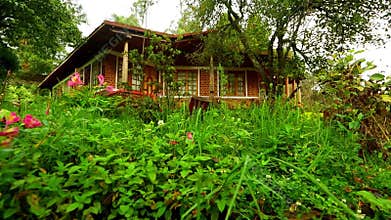 Morning Effects House Exterior Back Site - Low Angle Down to Top Panning Shot