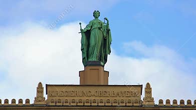 Lady Justice statue atop Upper Bavarian governmental building in Munich, Germany
