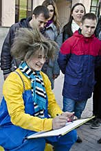 Street artist who makes portraits, Moscow, Russia