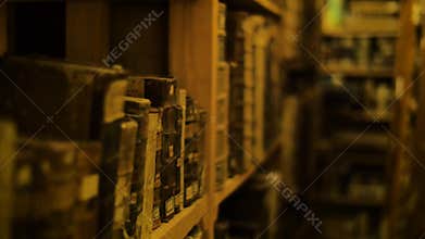 Bookshelves in old library with lots of books
