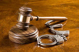 Gavel and handcuffs