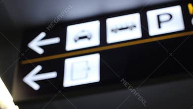 Airport directions sign: taxi, bus, parking, exit